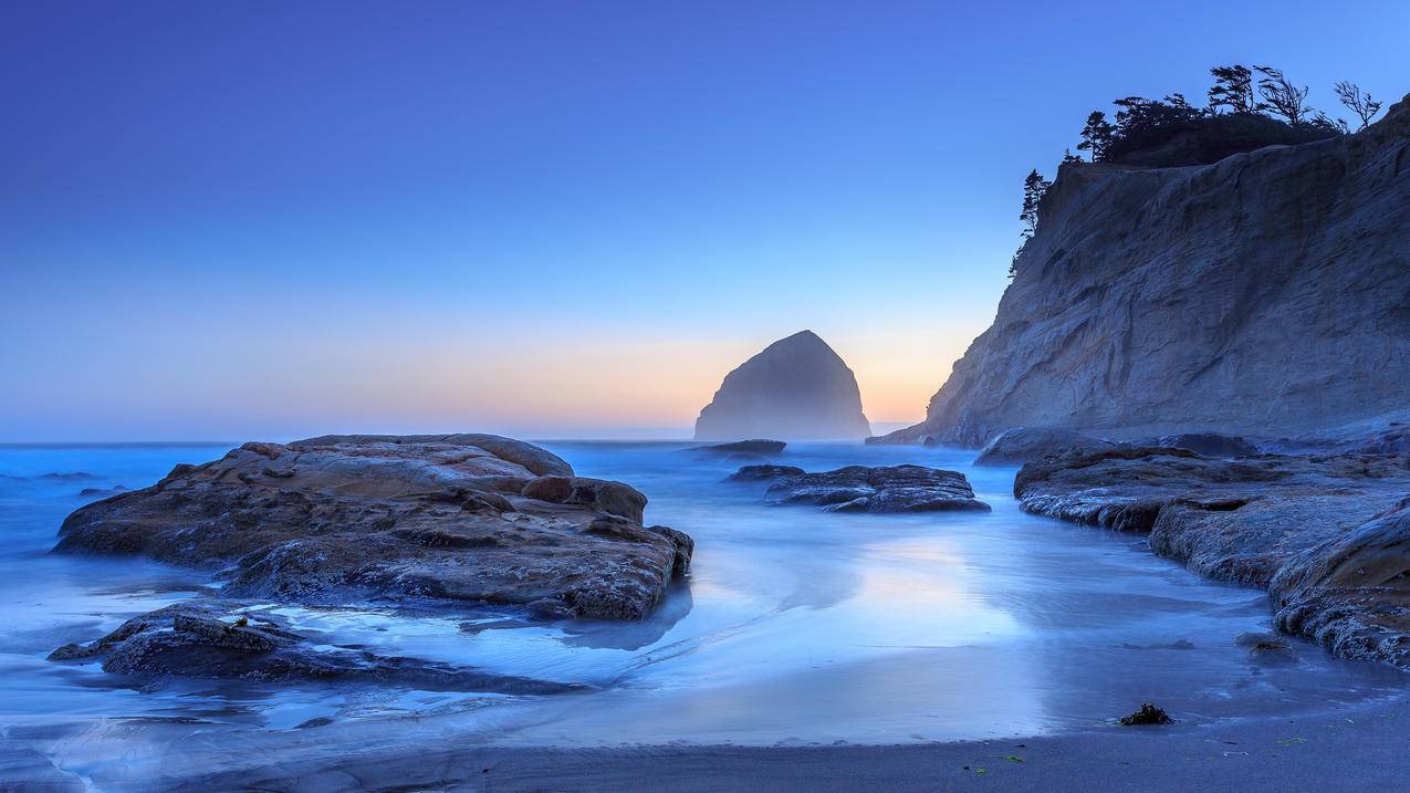 太平洋城市俄勒冈州岩石海滩日落风景4k壁纸